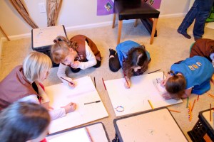 Brownies and Daisies working on their stories